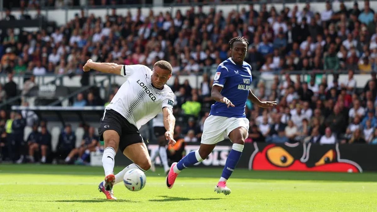 Player from Derby County kicking the ball during match