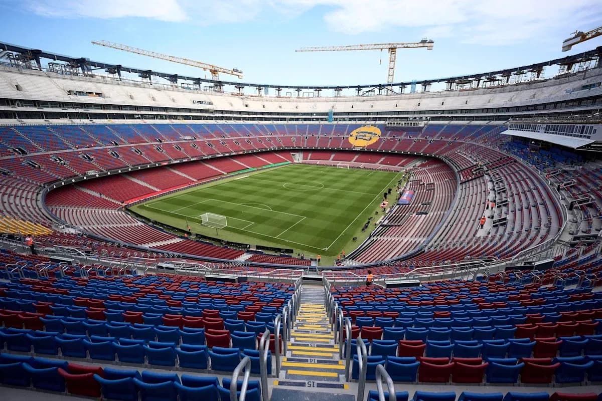 View of stadium seating and football pitch under construction