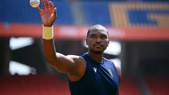 Cricketer practicing bowling with a ball