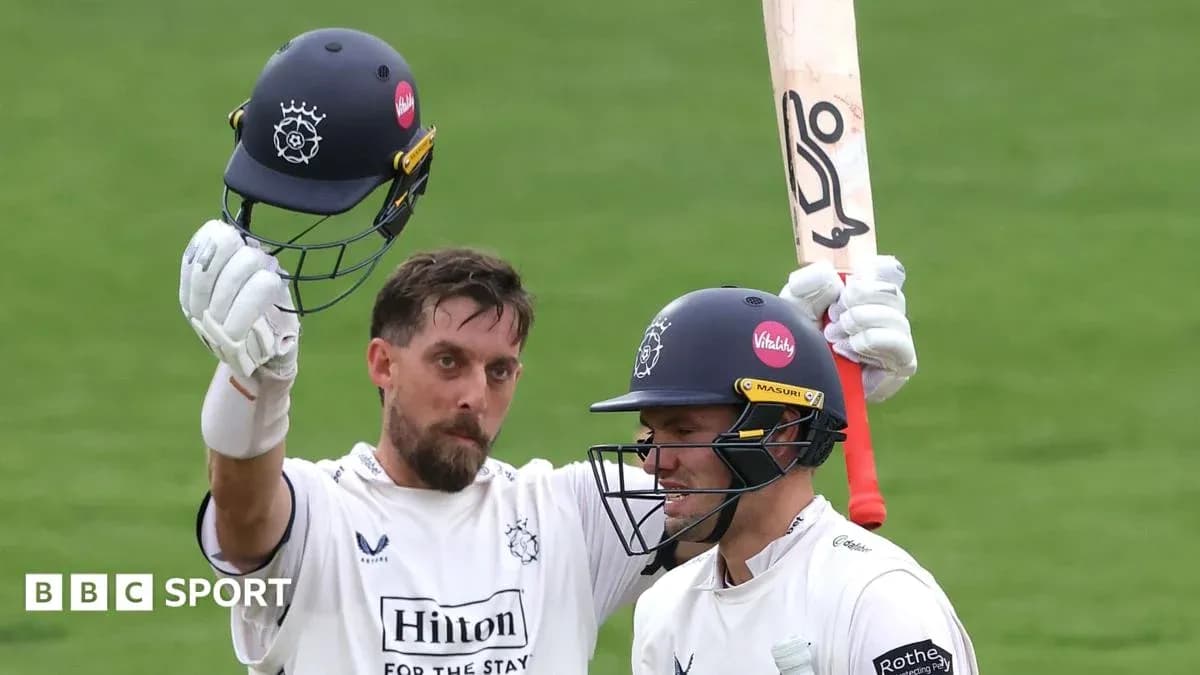 Cricketers celebrating after a successful innings