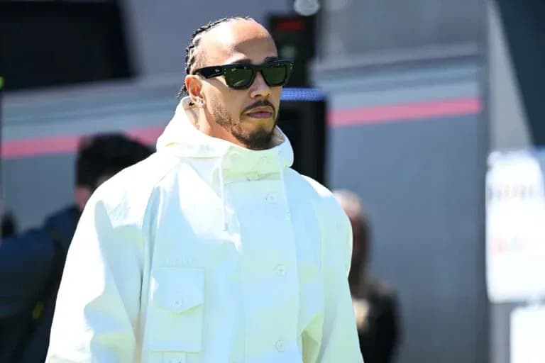 Lewis Hamilton arriving at the event in stylish outfit