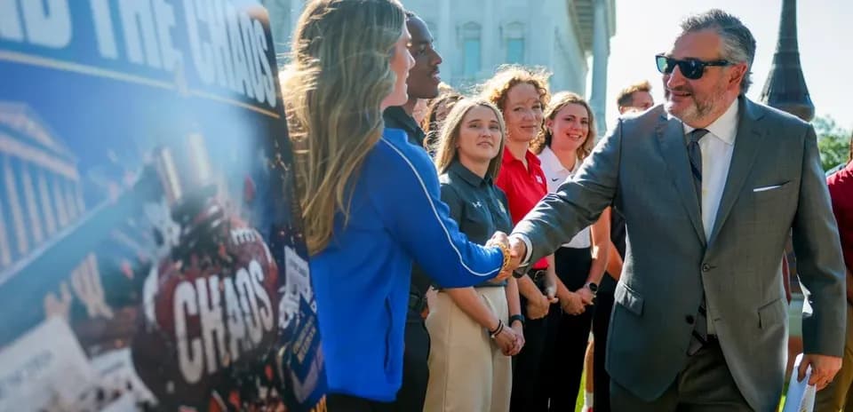 Politician shaking hands with athletes at event