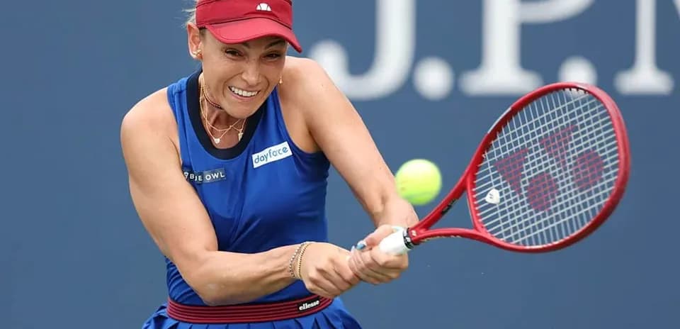 Tennis player hitting a ball with racket