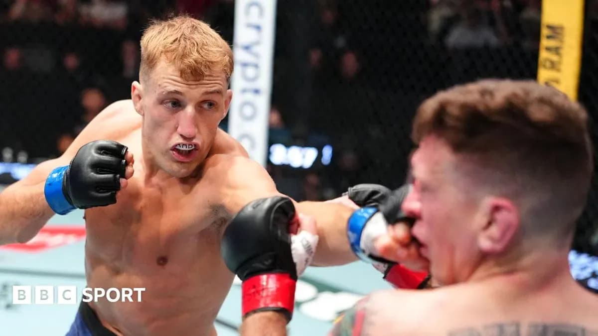 Fighter throwing a punch during MMA match