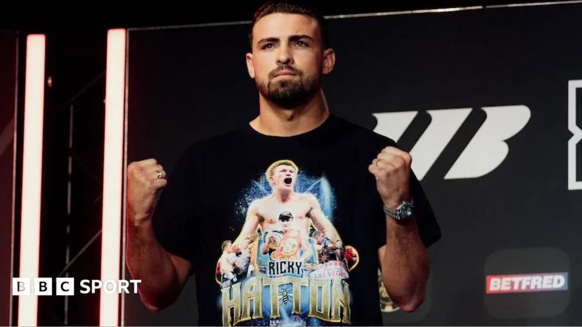 Boxer posing with fists raised at event