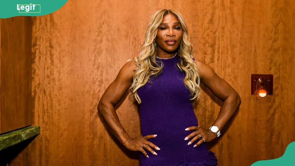 Athlete posing confidently in purple dress