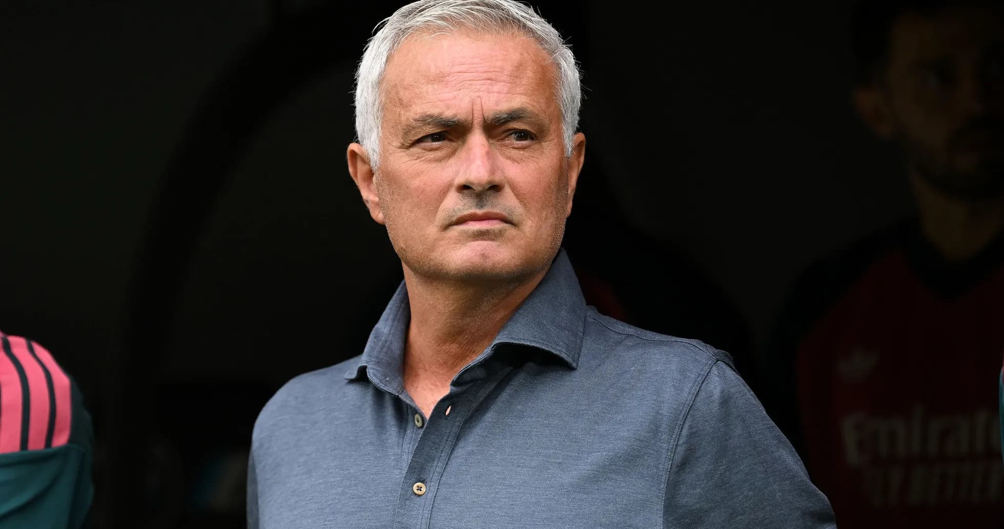 Manager observing from the sidelines during match