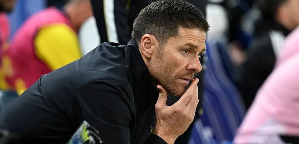 Coach observing match from the sidelines