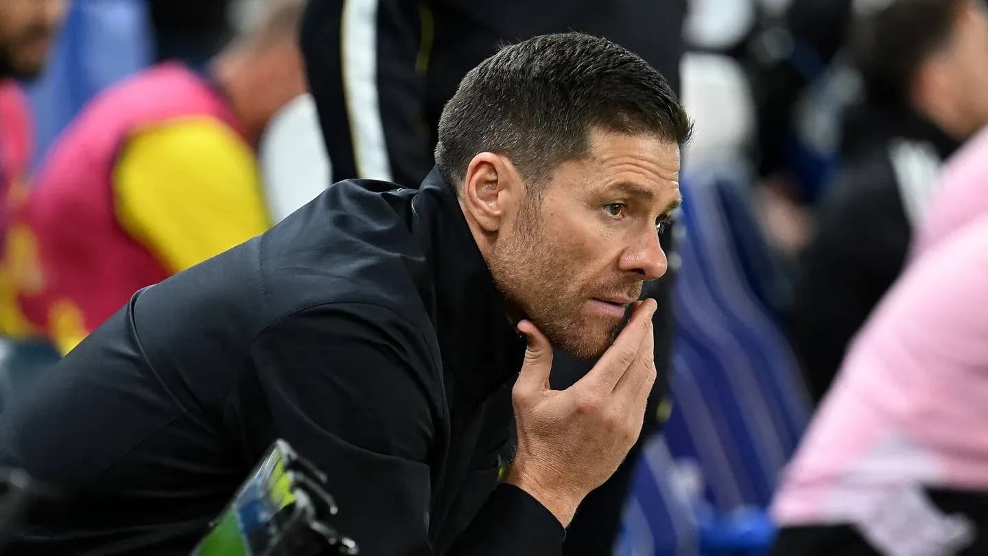 Coach observing match from the sidelines