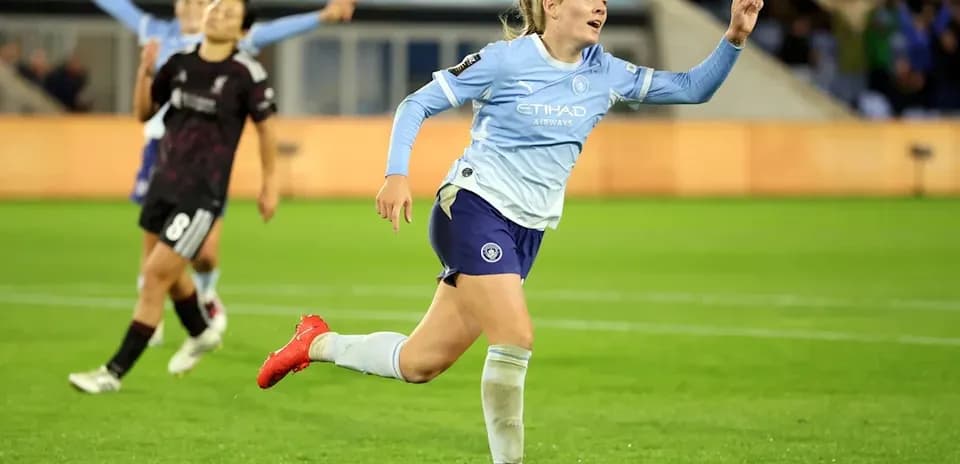 Player celebrating goal on the pitch during match