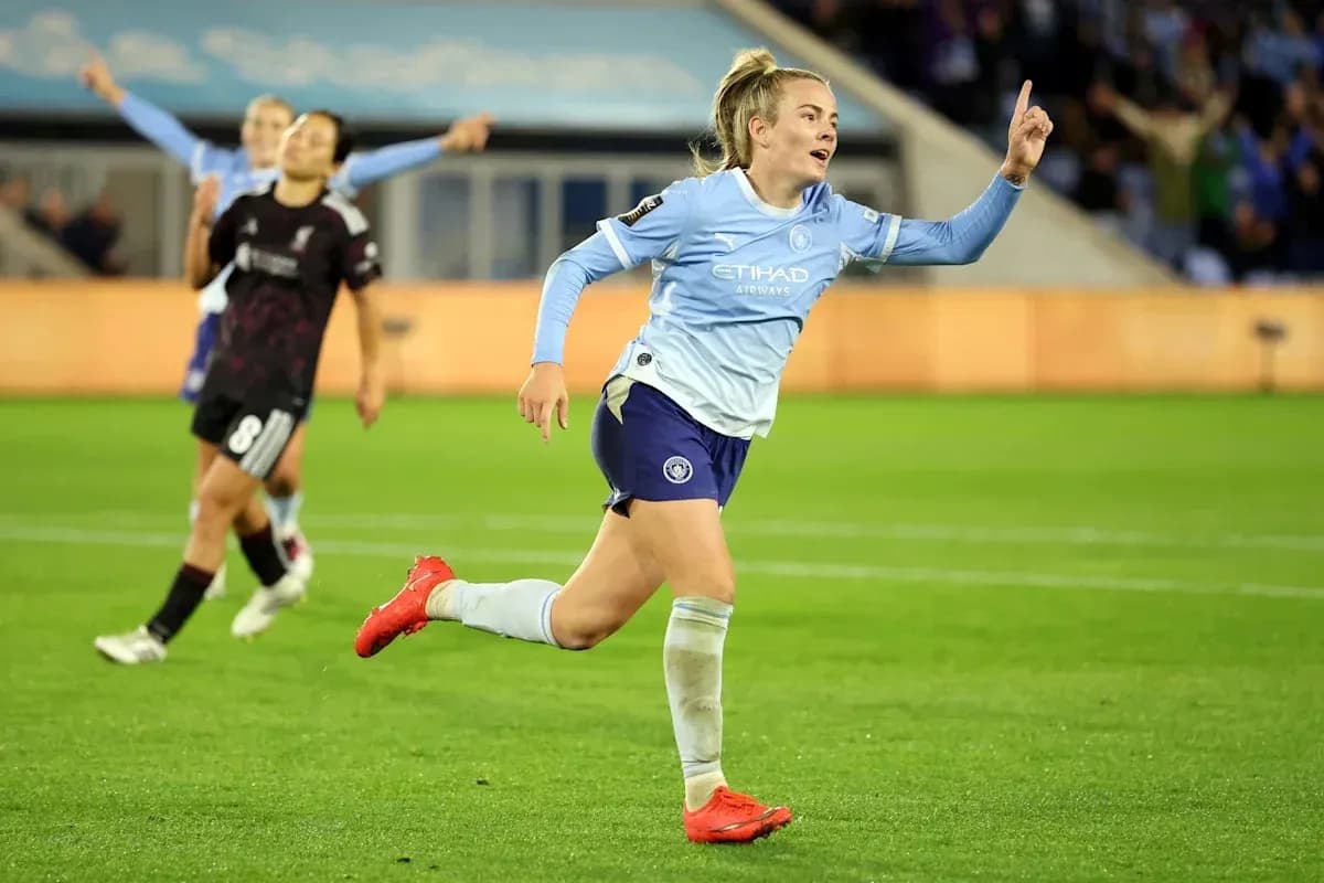 Player celebrating goal on the pitch during match