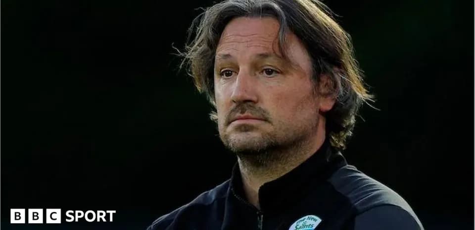 Coach observing during training session