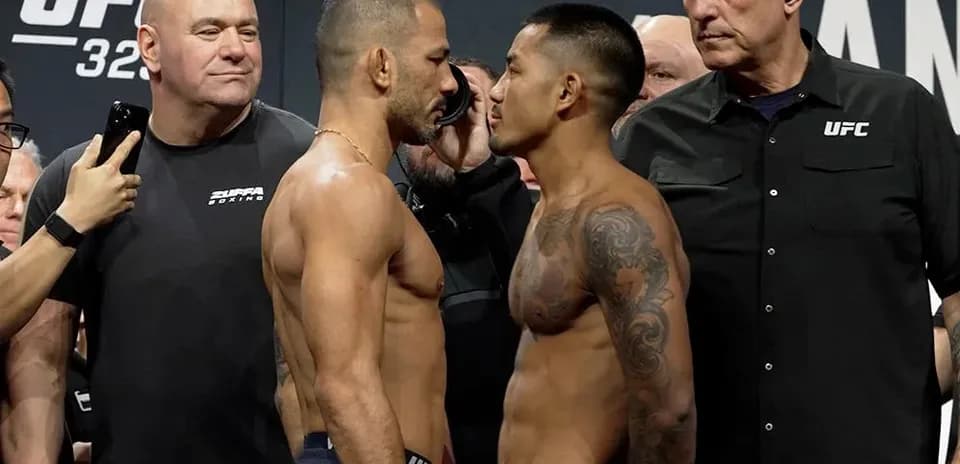 Two fighters facing off at UFC weigh-in event