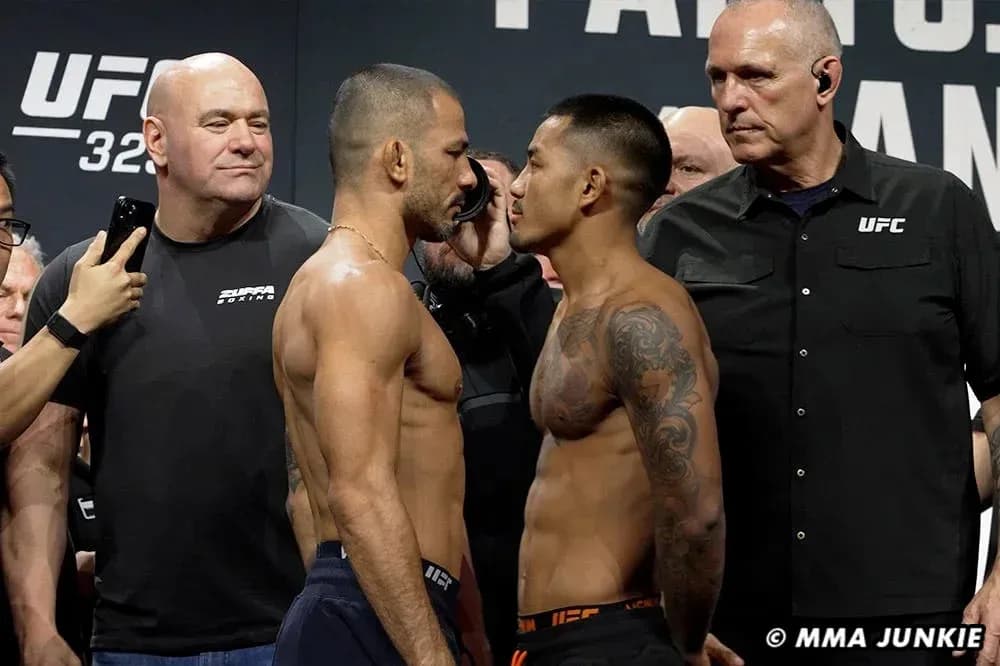 Two fighters facing off at UFC weigh-in event