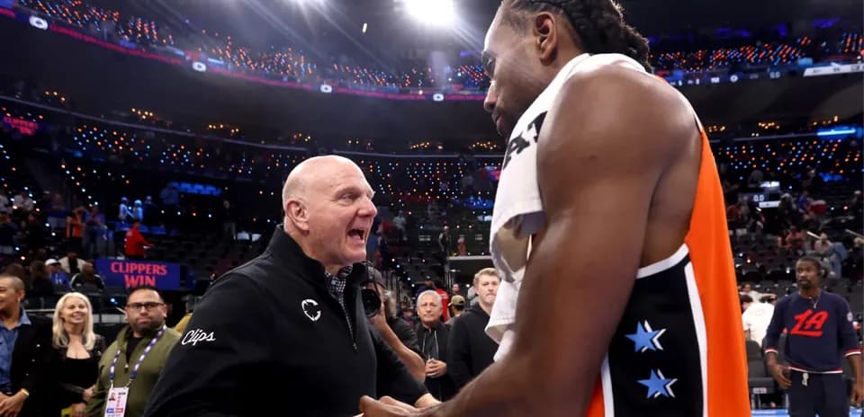 Steve Ballmer and Kawhi Leonard celebrating Clippers' victory