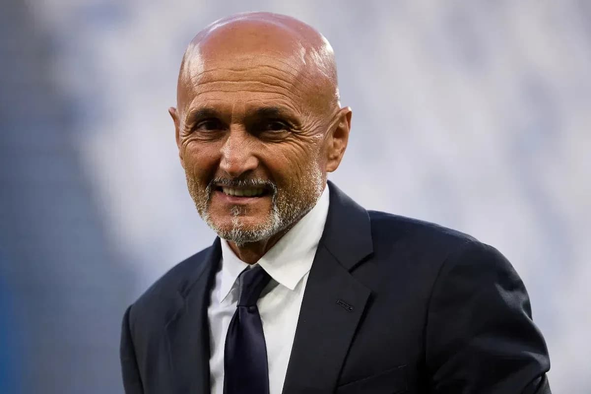 Coach smiling before the match in formal attire