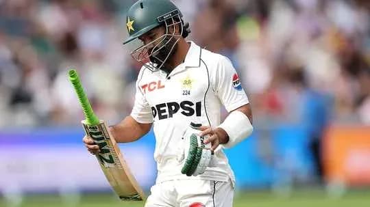 Batsman walking off field after dismissal in cricket match