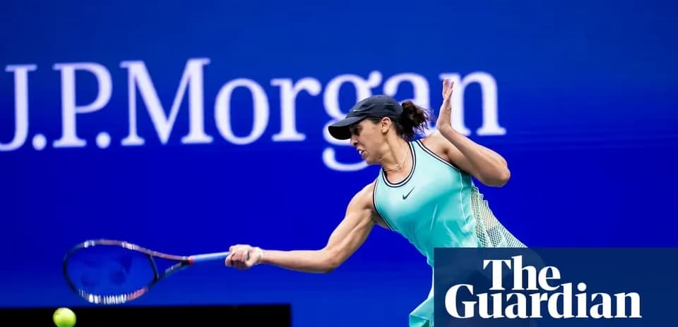 Female tennis player hitting a ball during match
