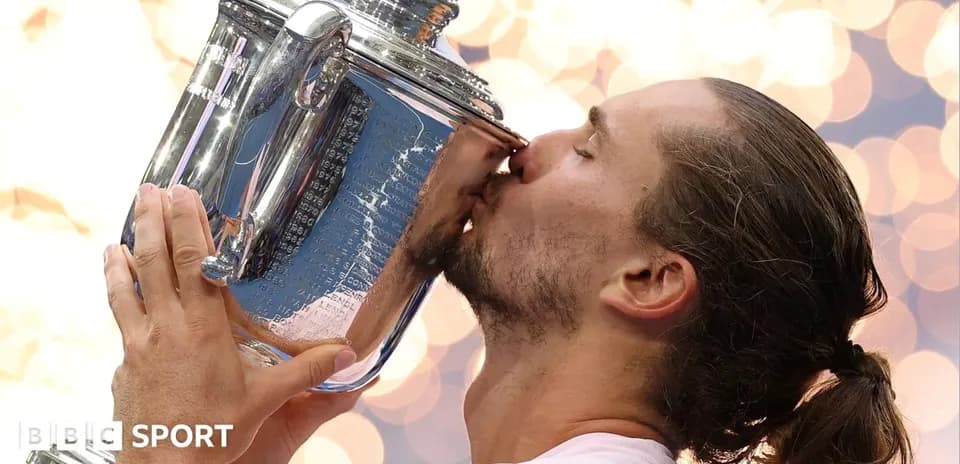 Player kissing trophy after winning championship