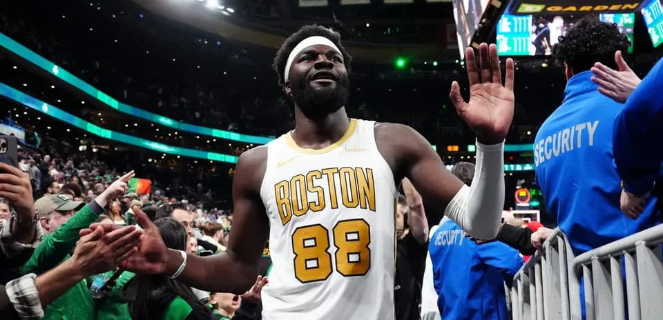 Player waving to fans after the game