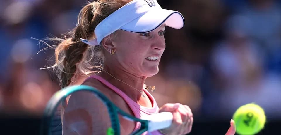 Tennis player preparing to hit a forehand shot