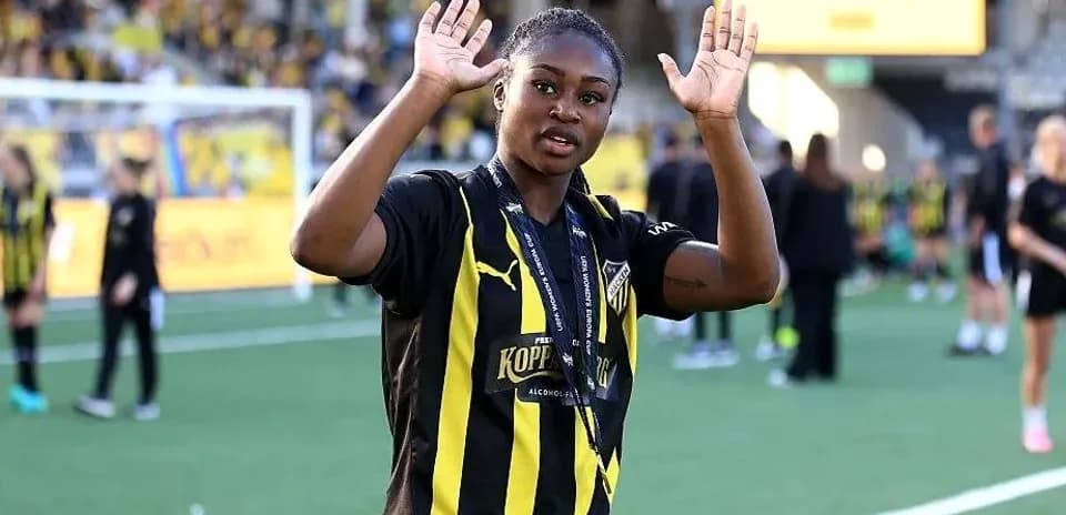 Player waving after winning the match celebration