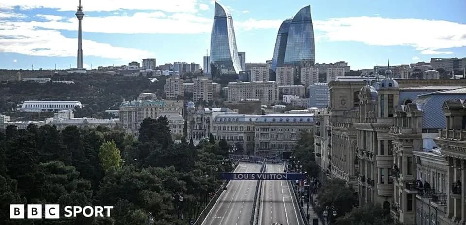 Formula 1 car racing in Baku cityscape