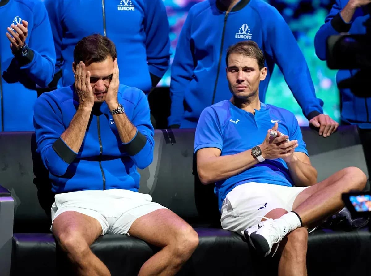 Roger Federer and Rafael Nadal sitting together, emotional