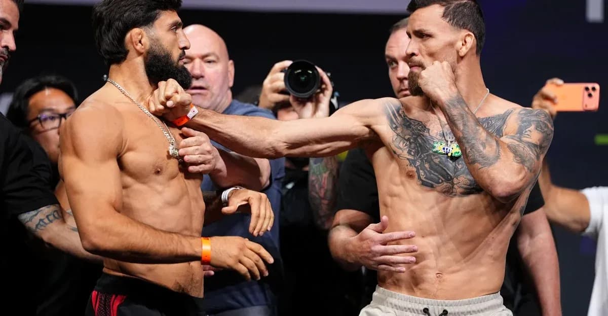 Two fighters facing off at weigh-in event
