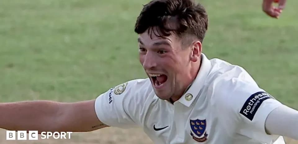 Cricketer celebrating a wicket on the field