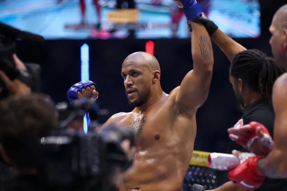 Fighter celebrating victory in the octagon
