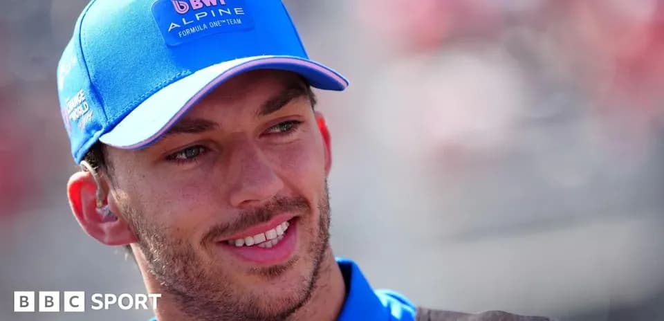 Driver wearing Alpine cap during event