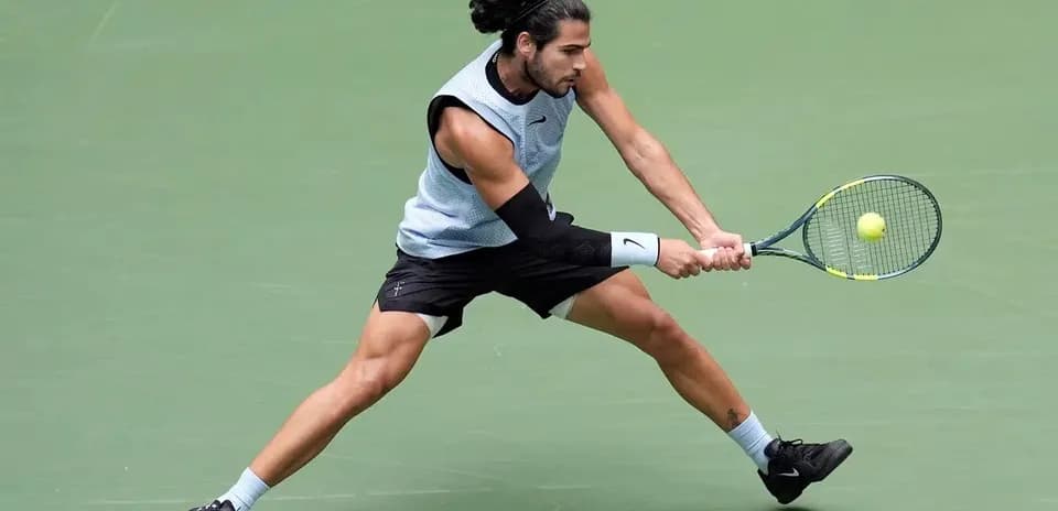 Player executing a forehand shot on court