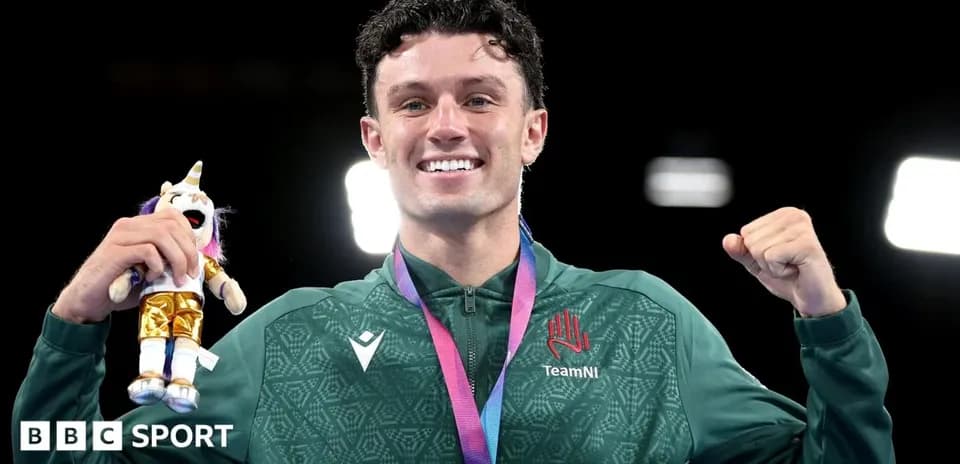 Athlete celebrating with medal and toy after victory