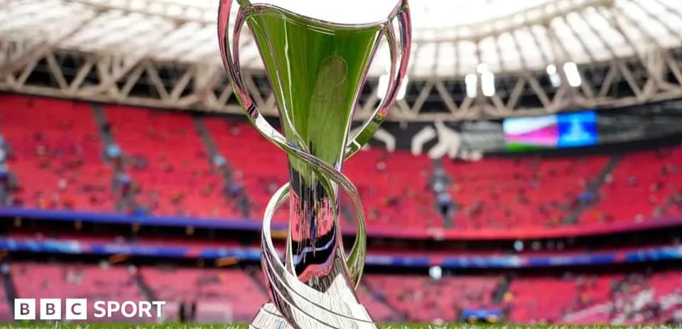 Trophy displayed on field before match