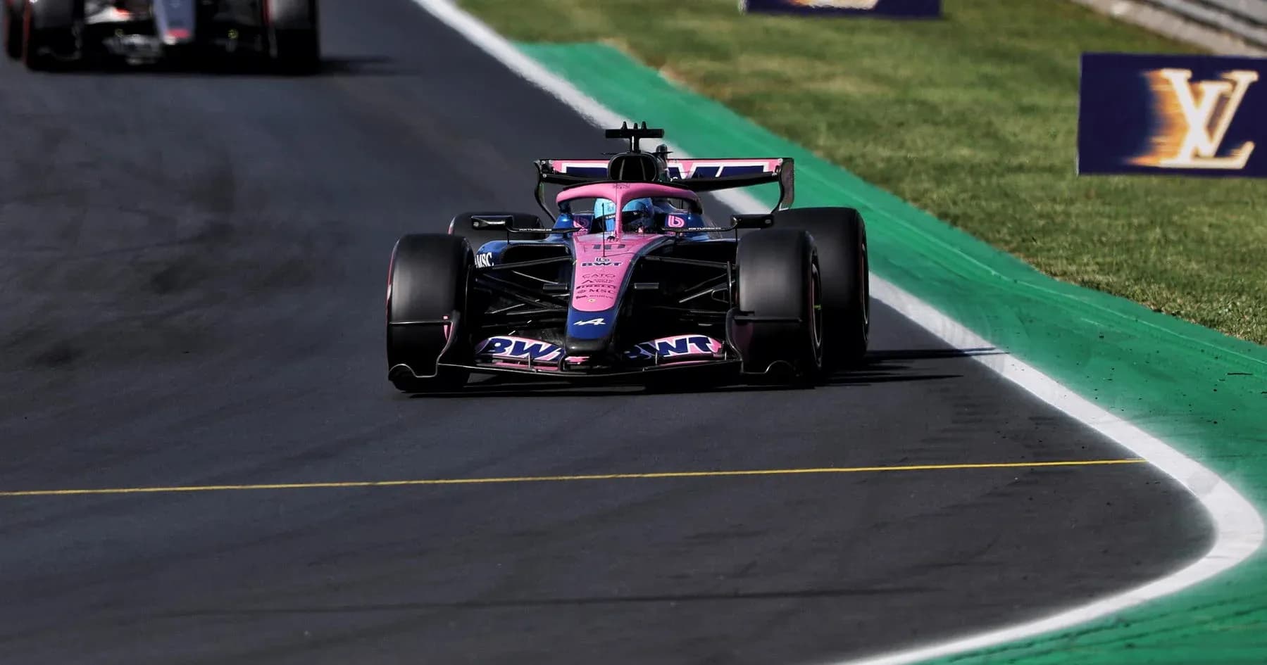 Race car speeding on track during Formula 1 event