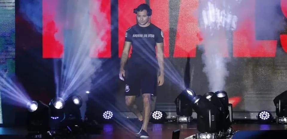 Athlete walking to the finals with stage lights