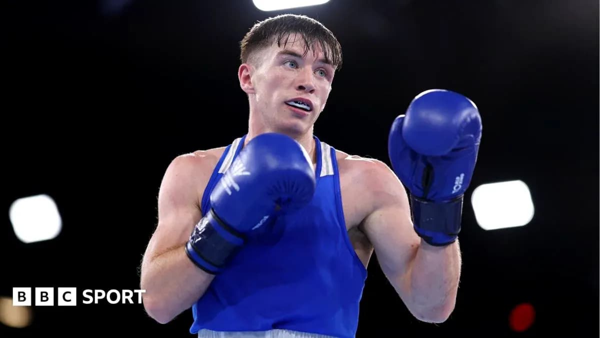 Boxer in blue gloves preparing for a match