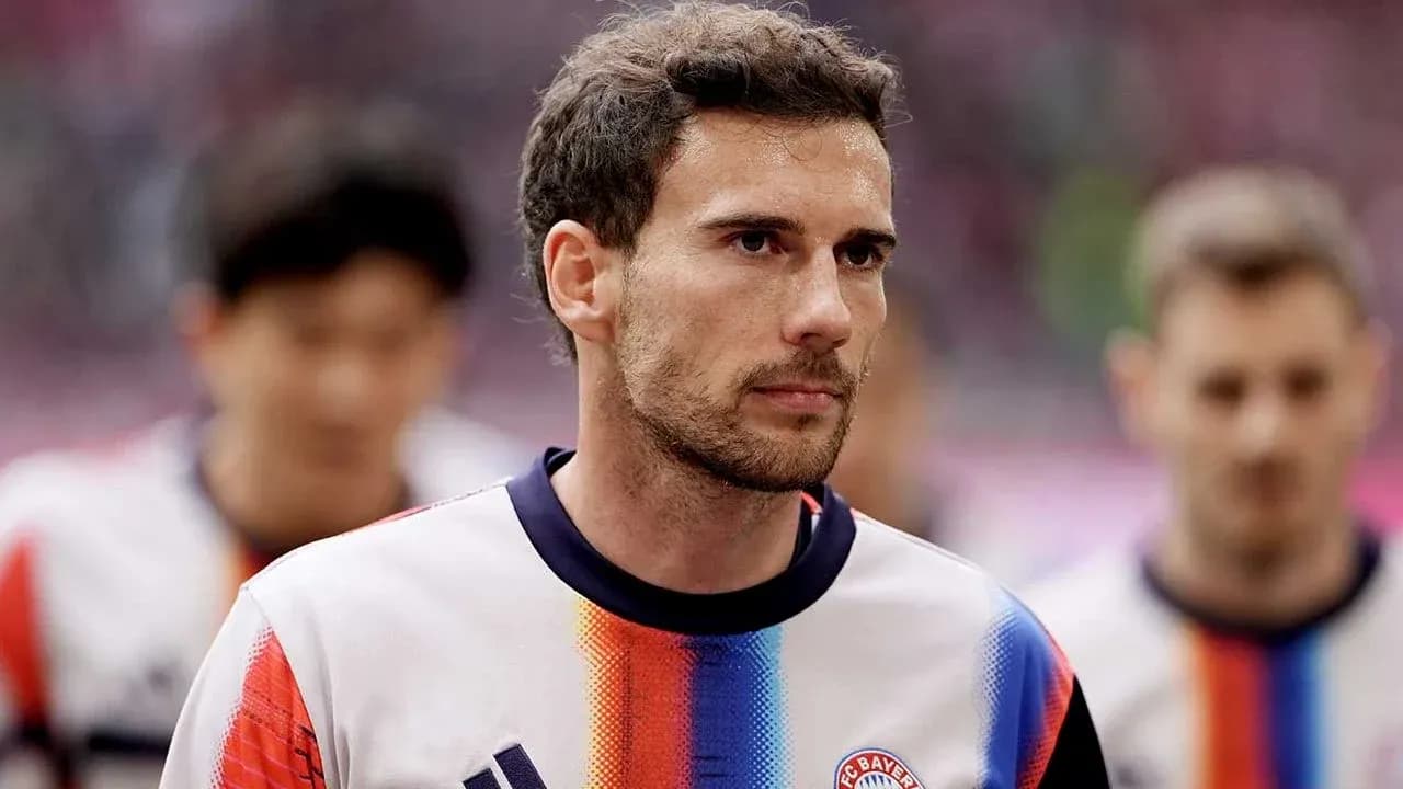 Player walking onto the field before the match