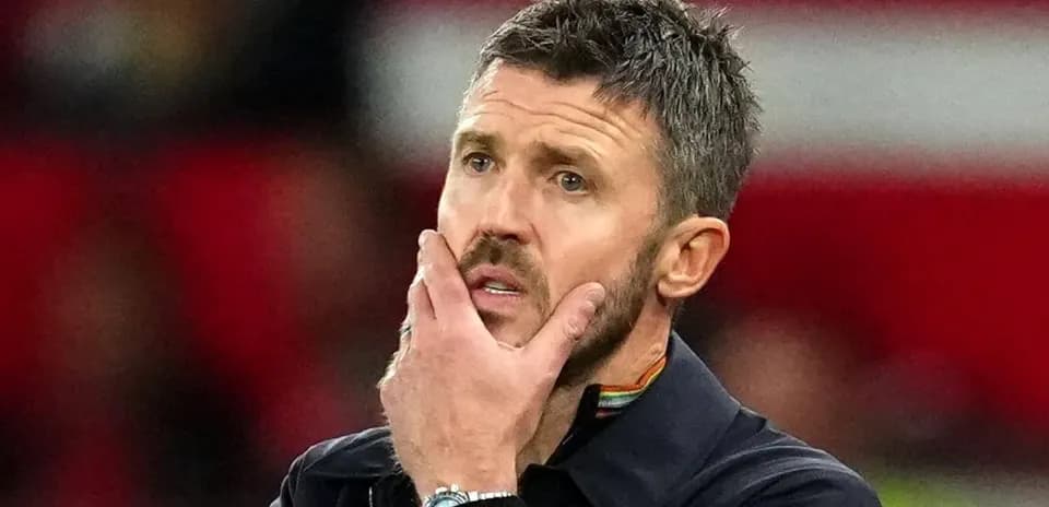 Coach looking thoughtful during a match