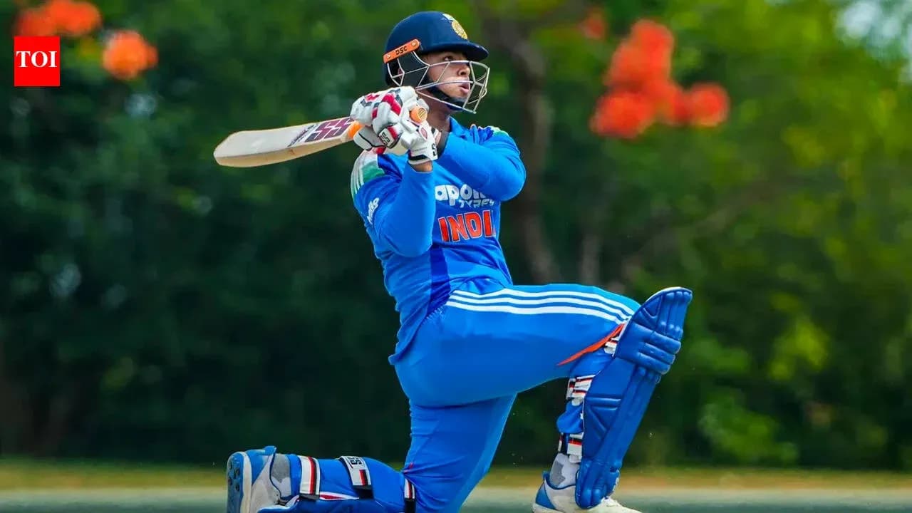 Batsman executing a shot during cricket match