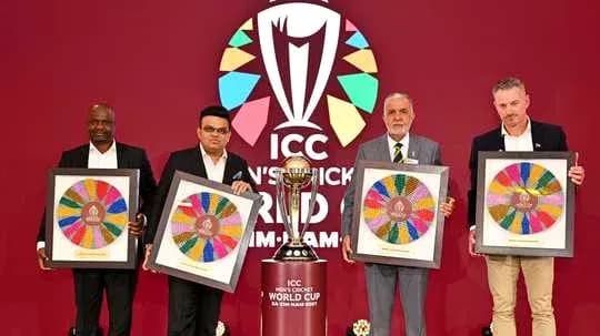 Four presenters holding awards at ICC World Cup event