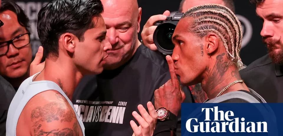 Two boxers face off during weigh-in event