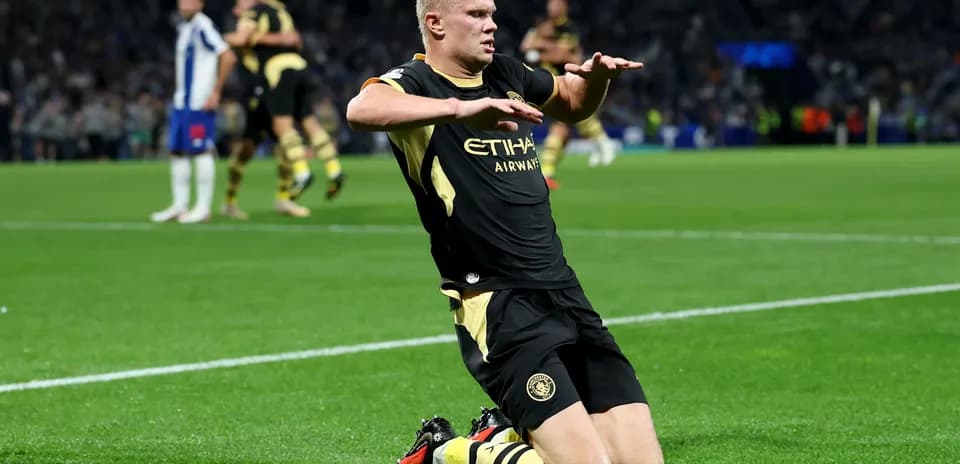 Player celebrating on the field after scoring goal