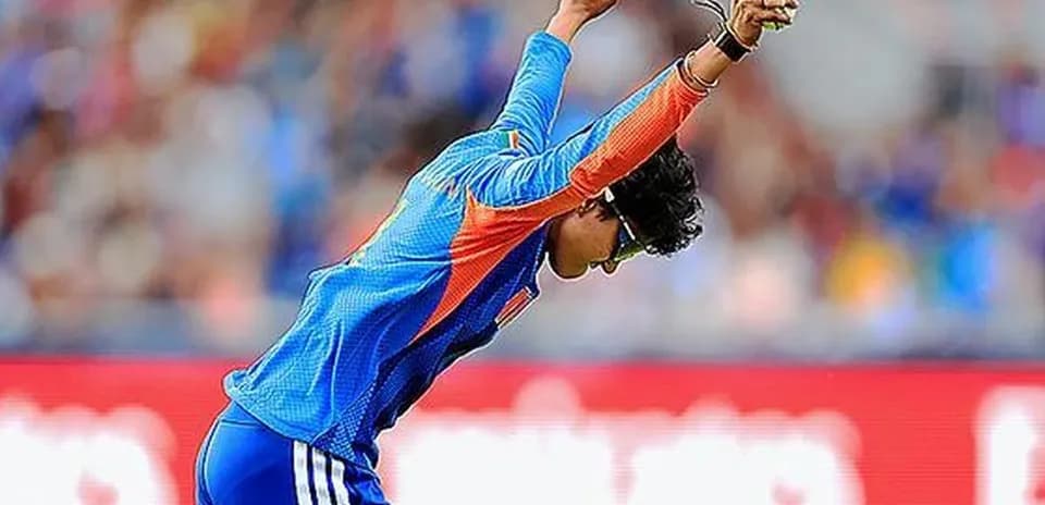 Cricketer celebrating a wicket during a match