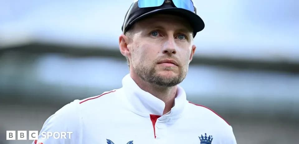 Cricketer wearing England kit during match