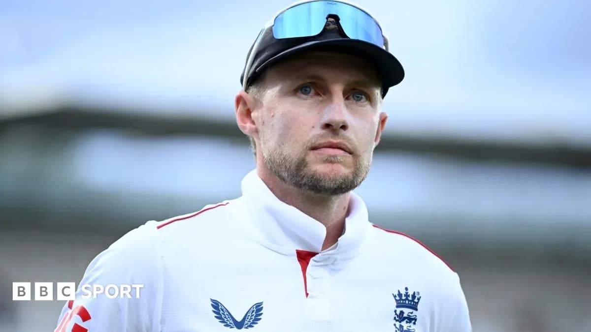 Cricketer wearing England kit during match
