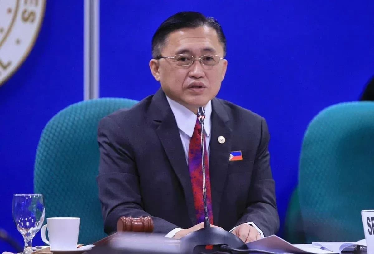 Official speaking at a conference table