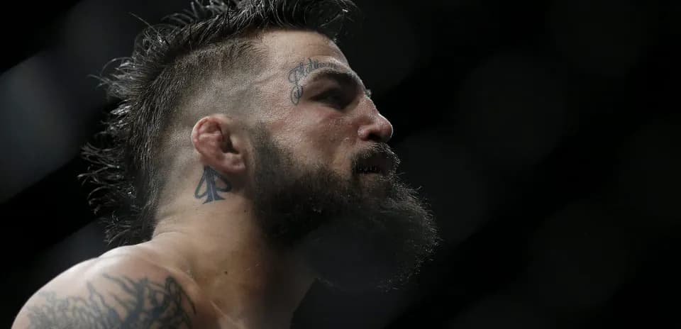 Close-up of fighter with beard and tattoos