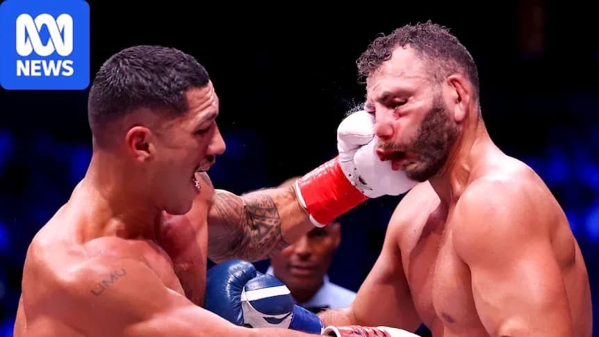 Boxer landing a punch during a match